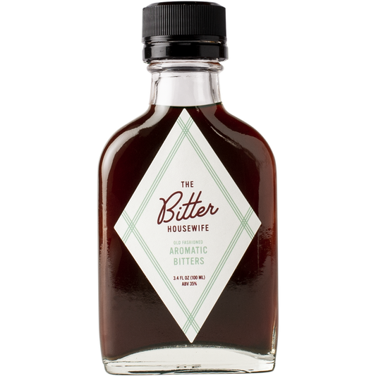 The front of a bottle of The Bitter Housewife Aromatic Cocktail Bitters
