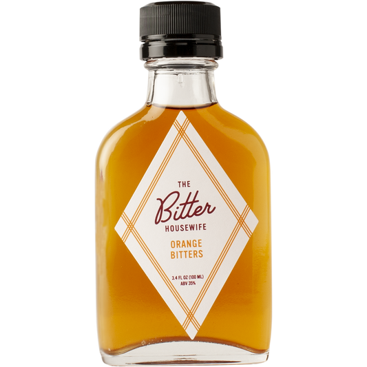 The front of a bottle of The Bitter Housewife Orange Cocktail Bitters